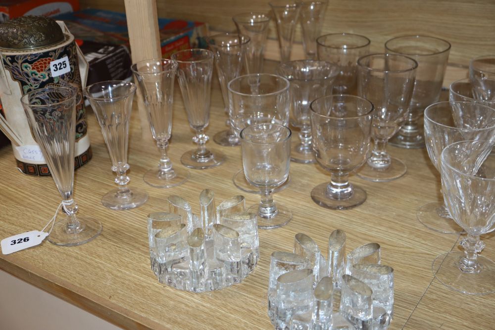 A quantity of glass rummers, flutes, etc.